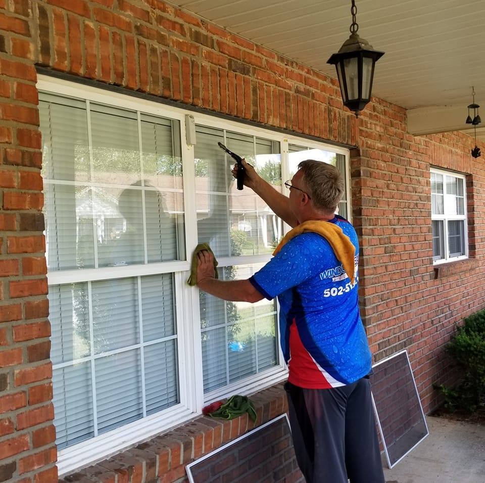 Louisville Window Cleaning technician at work